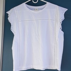 Sleeveless White Blouse
